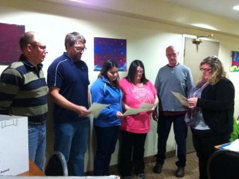 PSAC NB Director proceeding with the Oath of Office of the newly elected officers